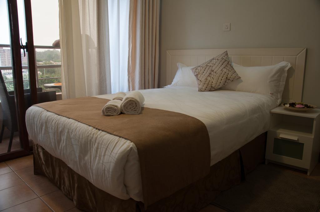 Eddy Suites, Emeli Hotel ナイロビ エクステリア 写真