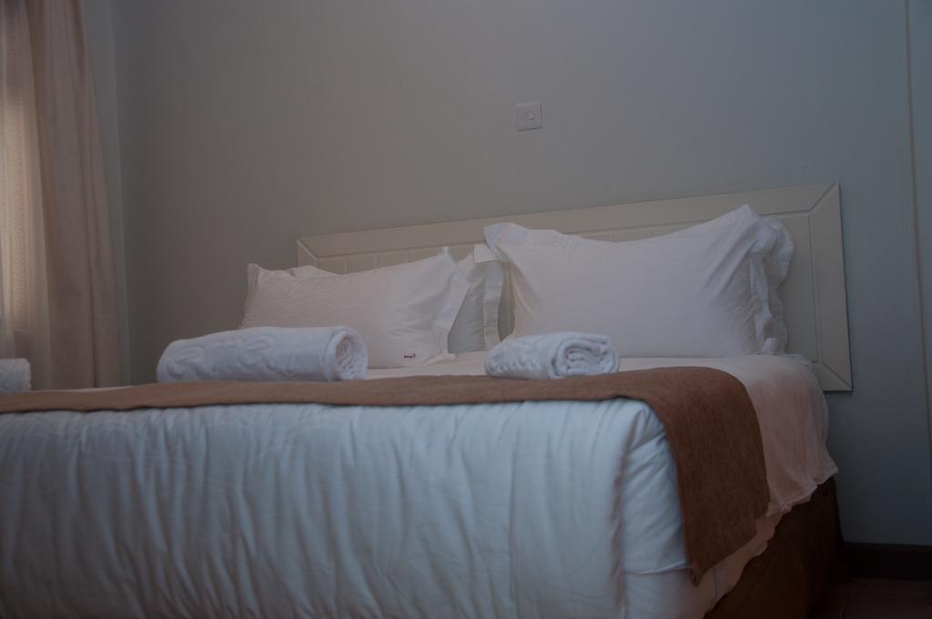 Eddy Suites, Emeli Hotel ナイロビ エクステリア 写真